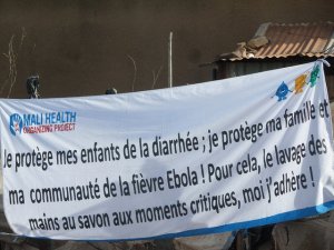 A banner by Mali Health promoting hand washing for the prevention of diarrhea and Ebola